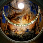 Inside view of a building ceiling with jesus painting