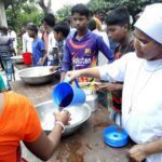 Image showing kind gesture, feeding the hungry.