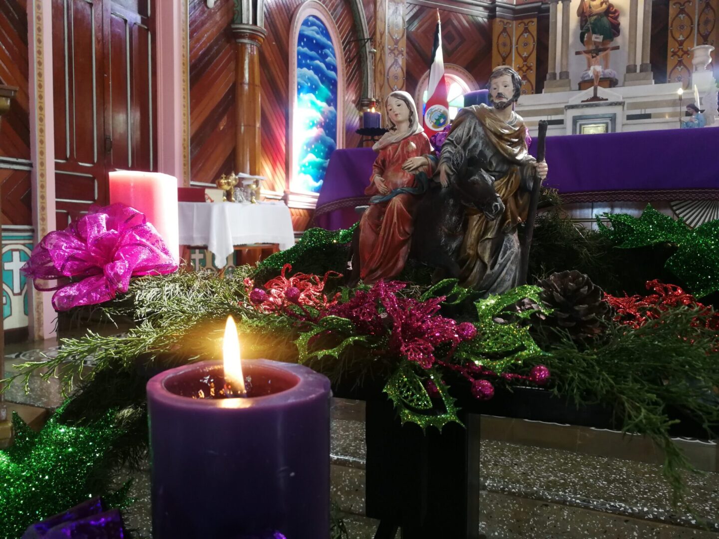Inside view of a church with jesus and mary statue