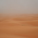 Closeup shot of desert sand and sky view
