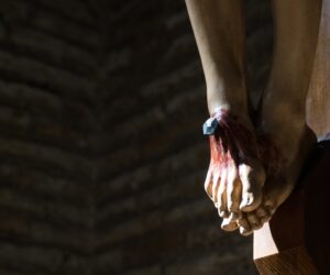 Feet shot of Jesus, crucified with a nail