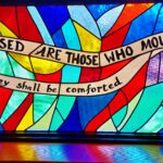 Stained glass window: "Blessed are those who mourn