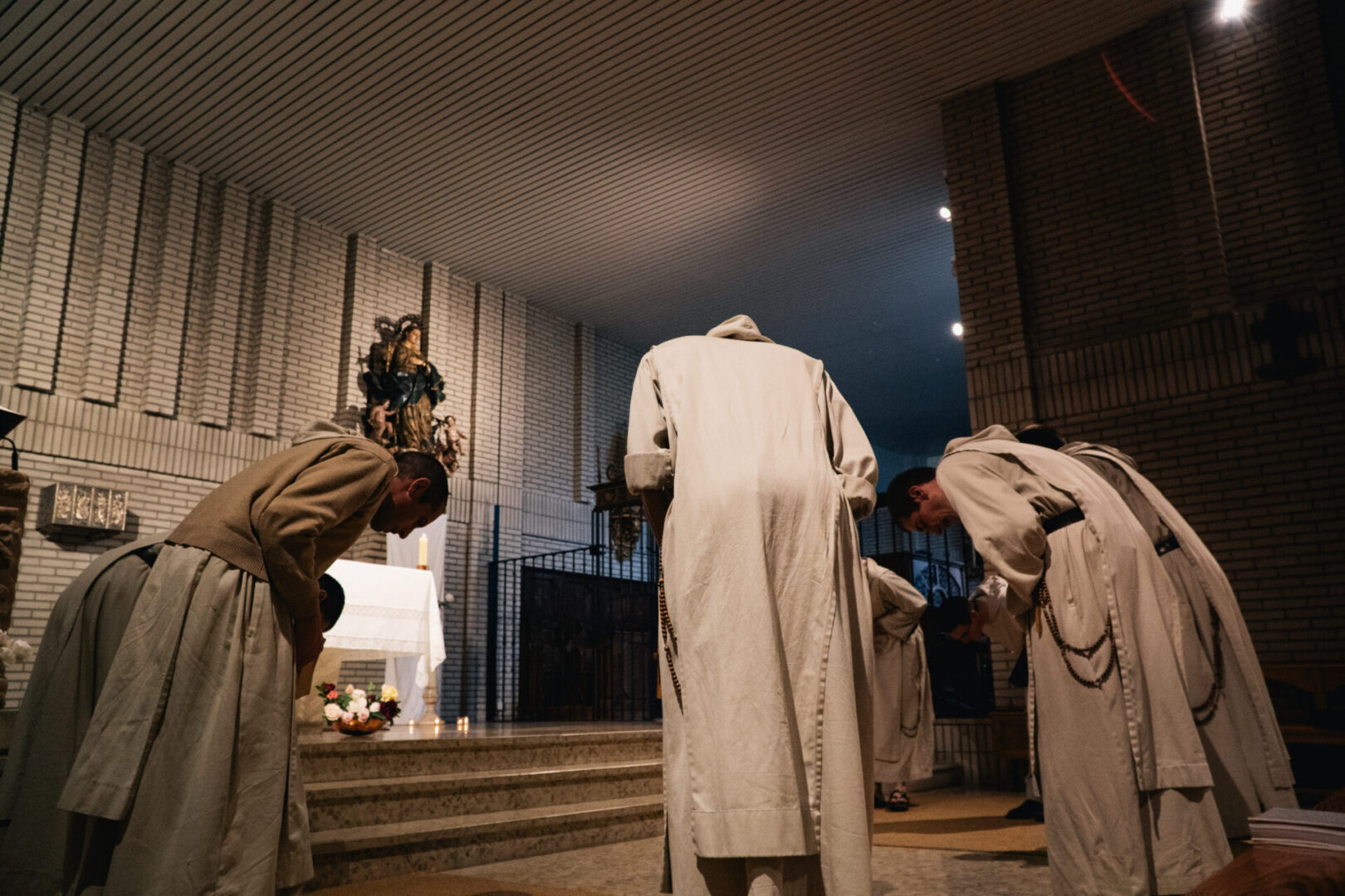 monks praying before the tabernacle by Almures Studio courtesy of Cathopic